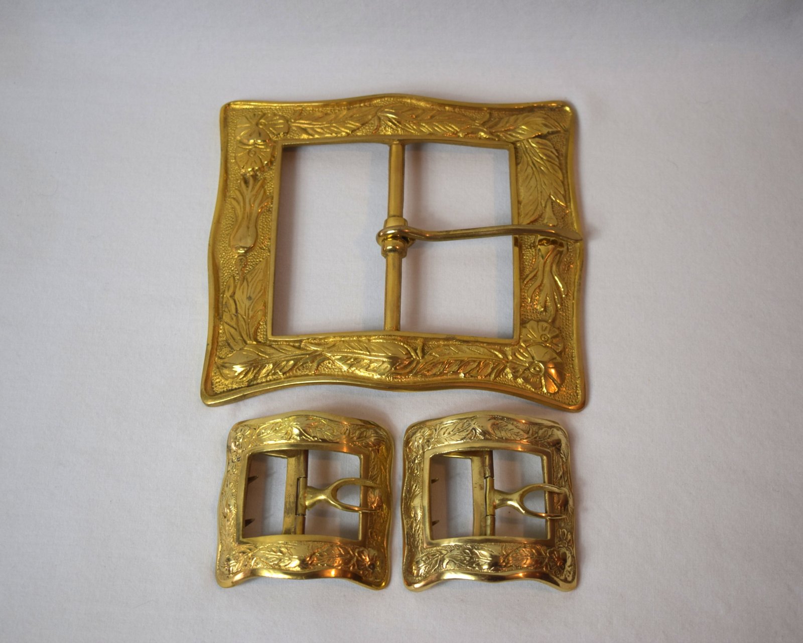 Solid Cast Brass Thistle Buckle for 4 inch belt with Matching Boot Buckles.